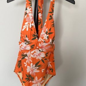Floral orange swimsuit.